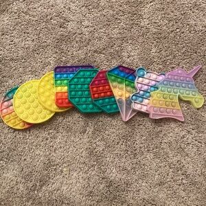 9 loved but great condition pop it’s!!